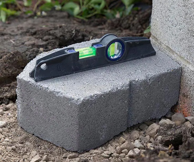 Level placed on a cinder block