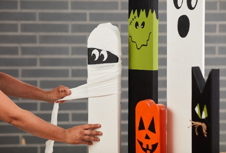 Person decorating DIY Halloween decorations