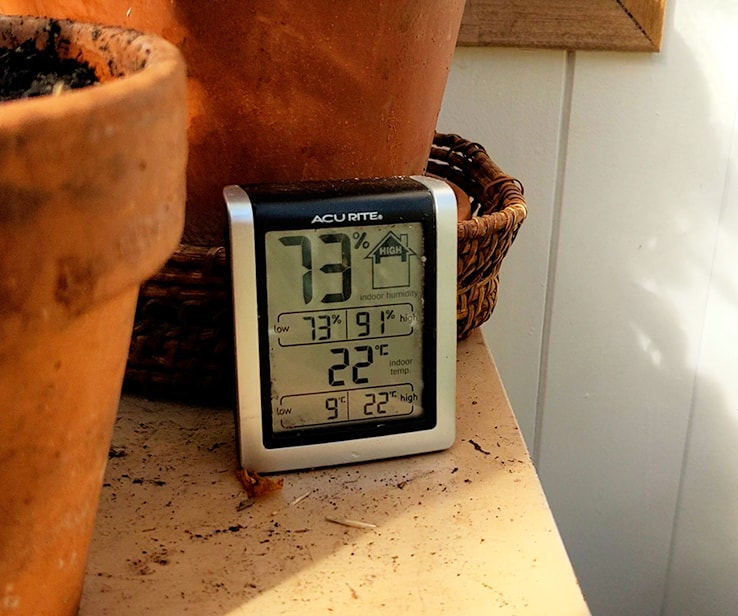 Digital thermometer in a garden greenhouse