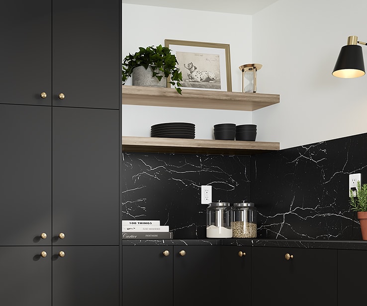 Black kitchen cabinets with wooden wall shelves