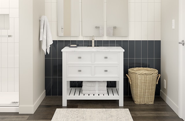 Bathroom vanity with navy blue backsplash