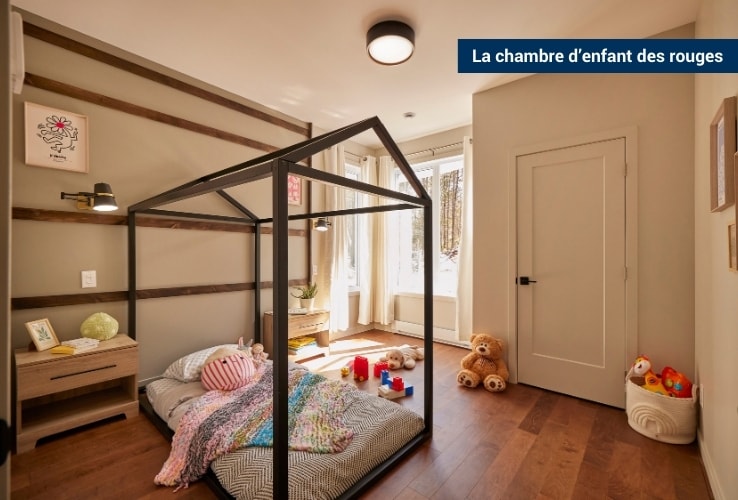 Une chambre d’enfants avec un lit en forme de maison