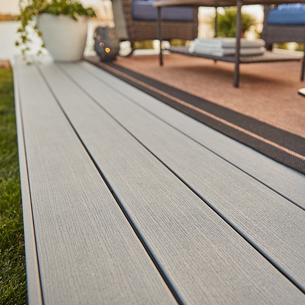 Close up on a light grey composite deck