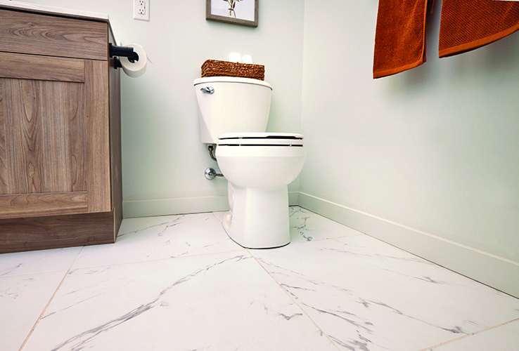 Bathroom with a mix of marbled tile